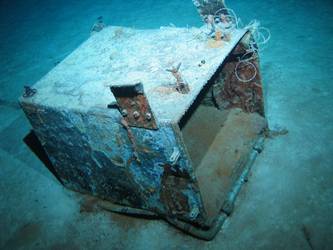 Rectangular tank or locker on seabed
